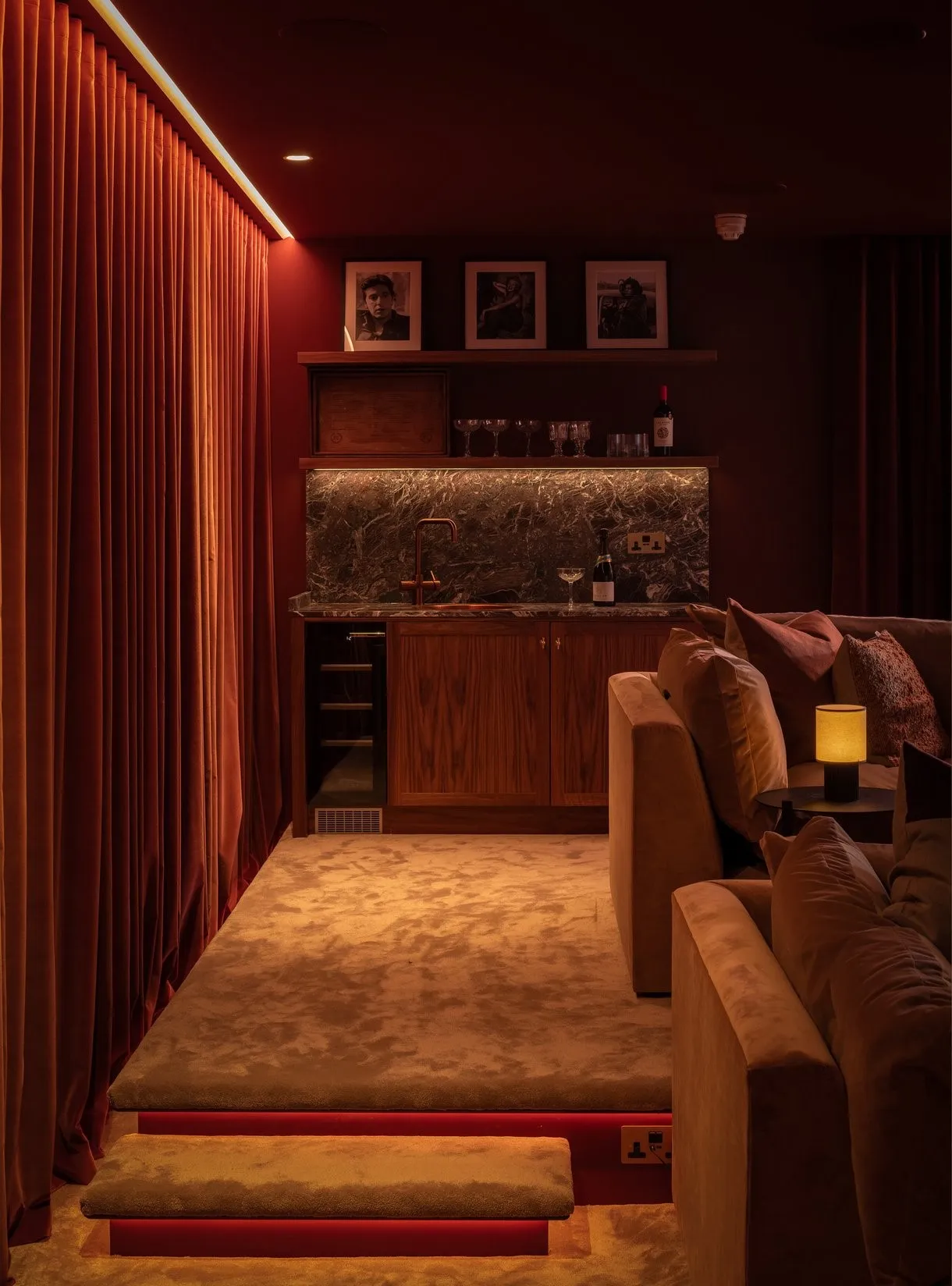 Cinema room bar with timber joinery and warm accent lighting