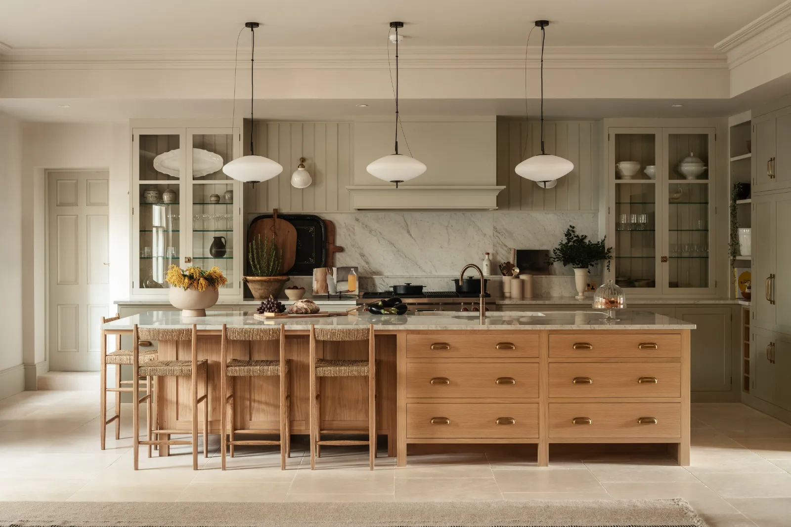 Kitchen with pendant lights over a timber island