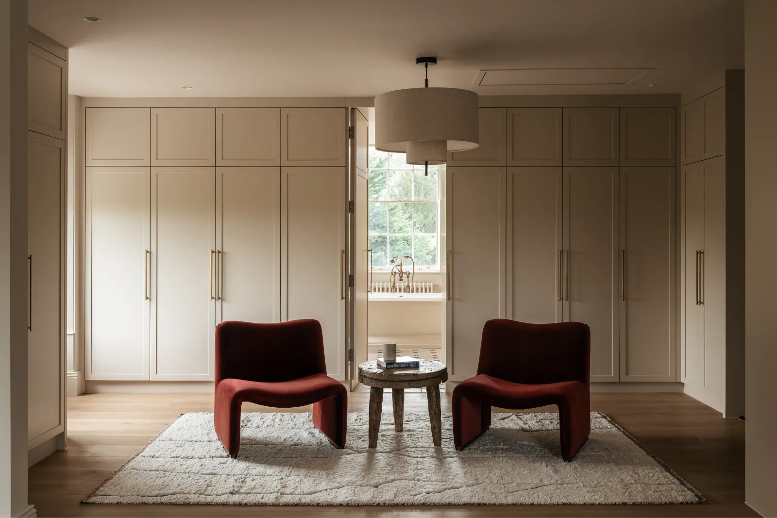 Quiet dressing room with two armchairs and a window